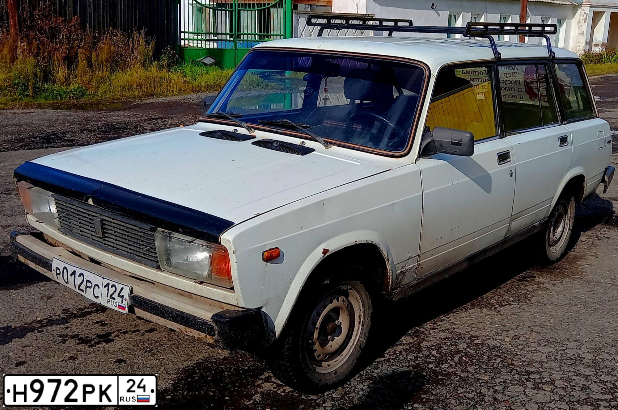Фото автомобиля LADA 2104, 1992 — госномер Р012РС124. Цвет: Белый