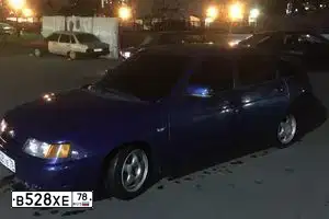 Фото автомобиля LADA 2112, 2003 — госномер В528ХЕ78. Цвет: СЕРЕБРИСТЫЙ ЯРКО-СИНИЙ
