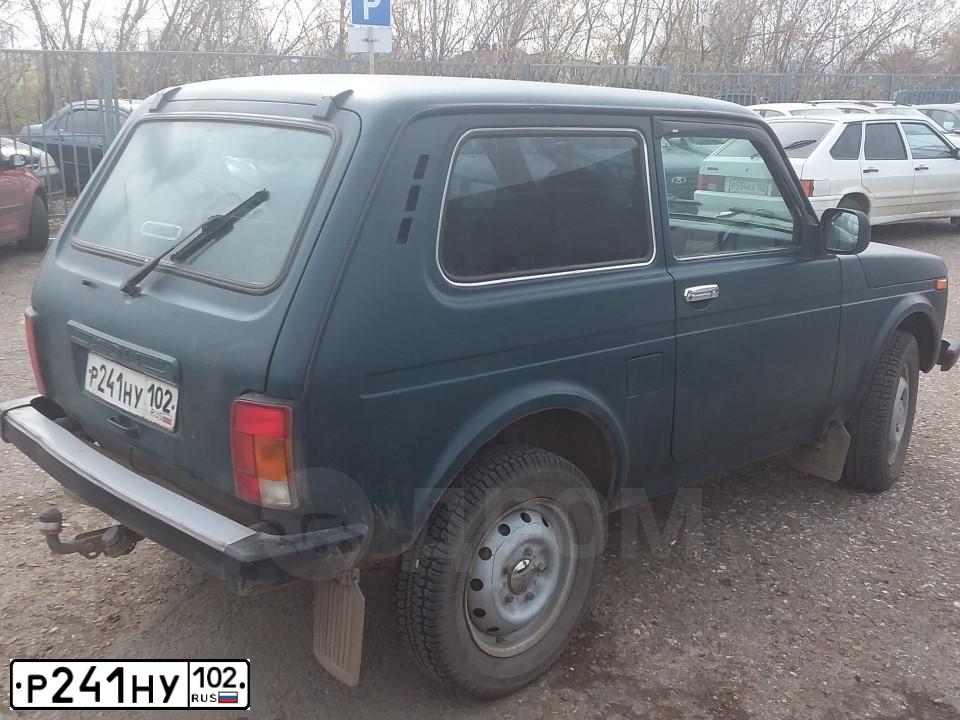 Фото автомобиля LADA 2121 NIVA, 2014 — госномер Р241НУ102. Цвет: Темно-зеленый