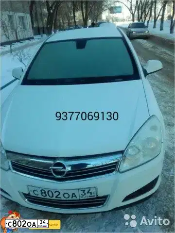 Фото автомобиля OPEL ASTRA, 2011 — госномер А638ОТ164. Цвет: БЕЛЫЙ