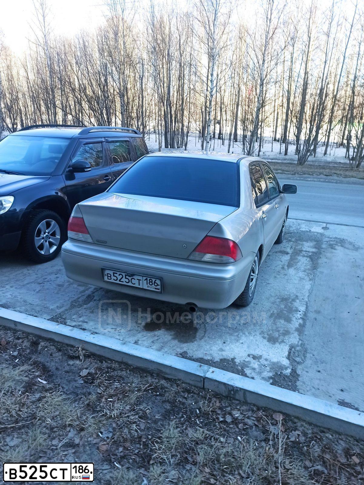 Фото автомобиля MITSUBISHI LANCER, 2000 — госномер В525СТ186