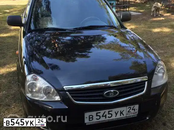Фото автомобиля MAZDA 3, 2005 — госномер А129КЕ124. Цвет: ЯРКО-КРАСНЫЙ
