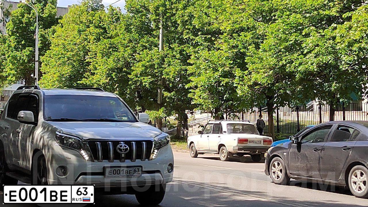 Фото автомобиля GAZ 3302 EL, 2006 — госномер Е001ВЕ163. Цвет: ФИОЛЕТОВЫЙ