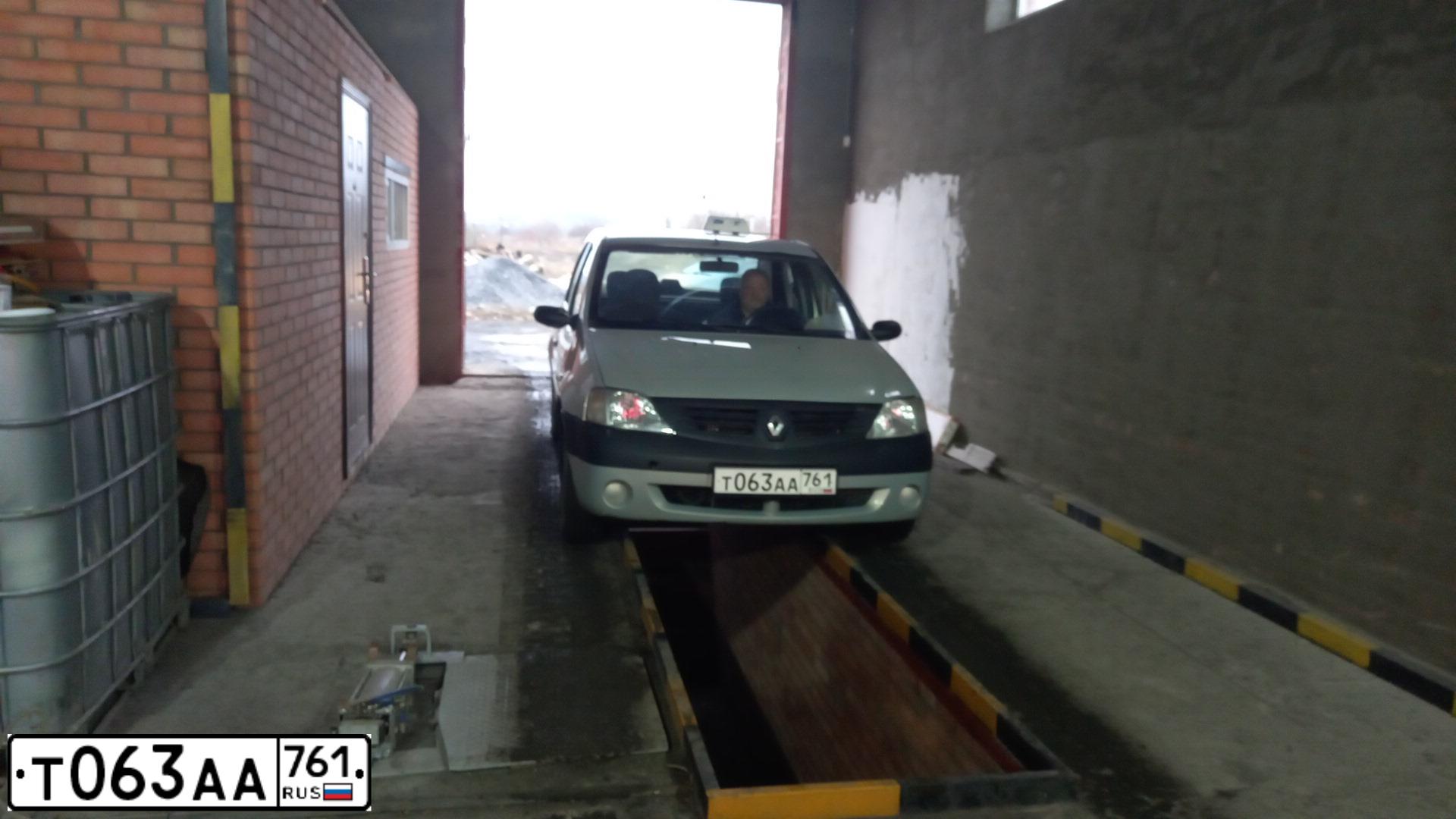 Фото автомобиля RENAULT LOGAN, 2007 — госномер Т063АА761. Цвет: СЕРЫЙ