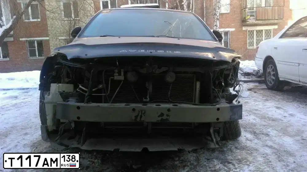 Фото автомобиля TOYOTA AVENSIS, 2008 — госномер Т117АМ138. Цвет: ТЕМНО-СИНИЙ