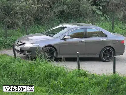 Фото автомобиля KIA CEE'D, 2007 — госномер Н576МА190. Цвет: ЧЕРНЫЙ