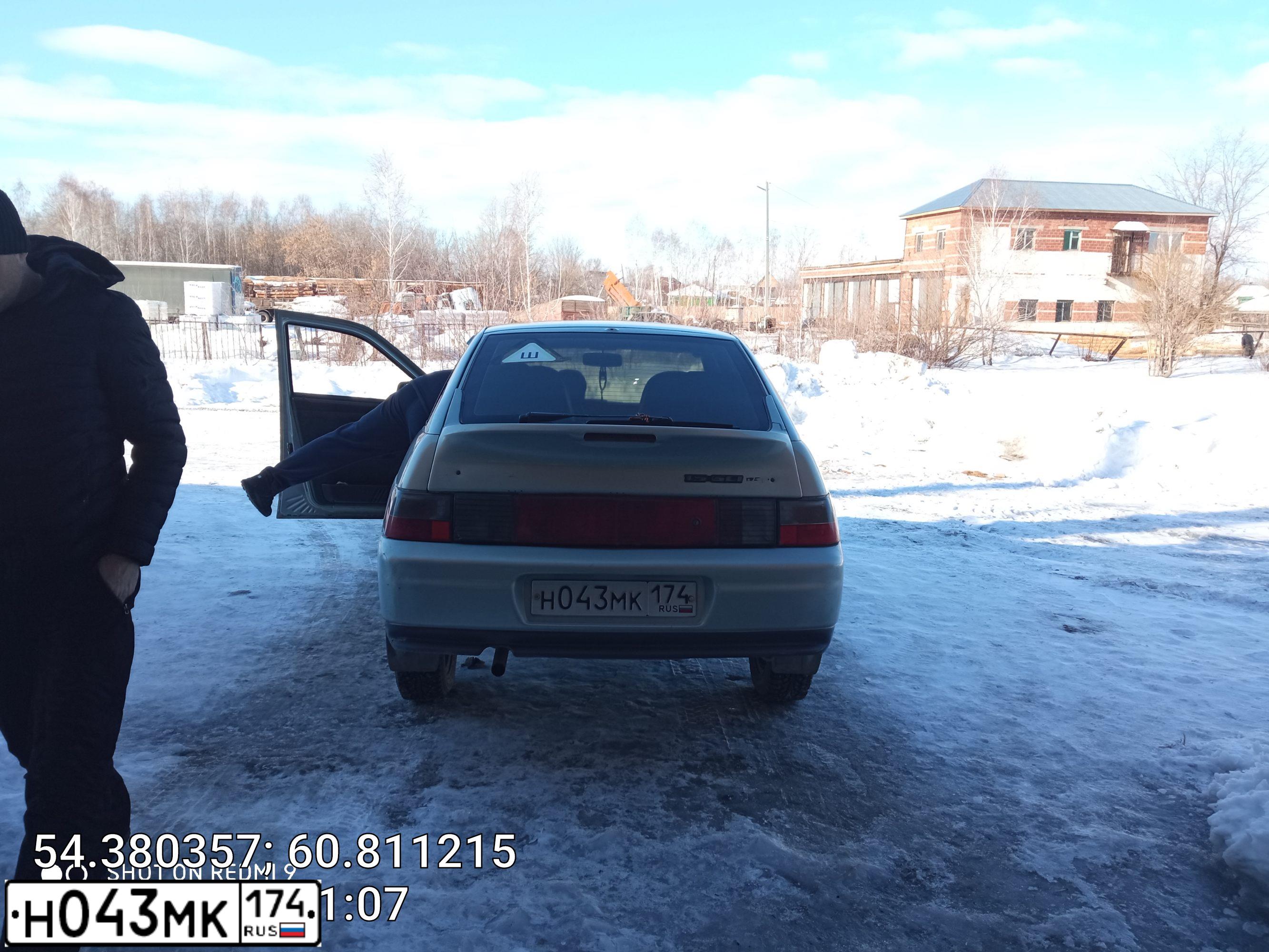 Фото автомобиля LADA 2112, 2002 — госномер Н043МК174. Цвет: СЕРЫЙ
