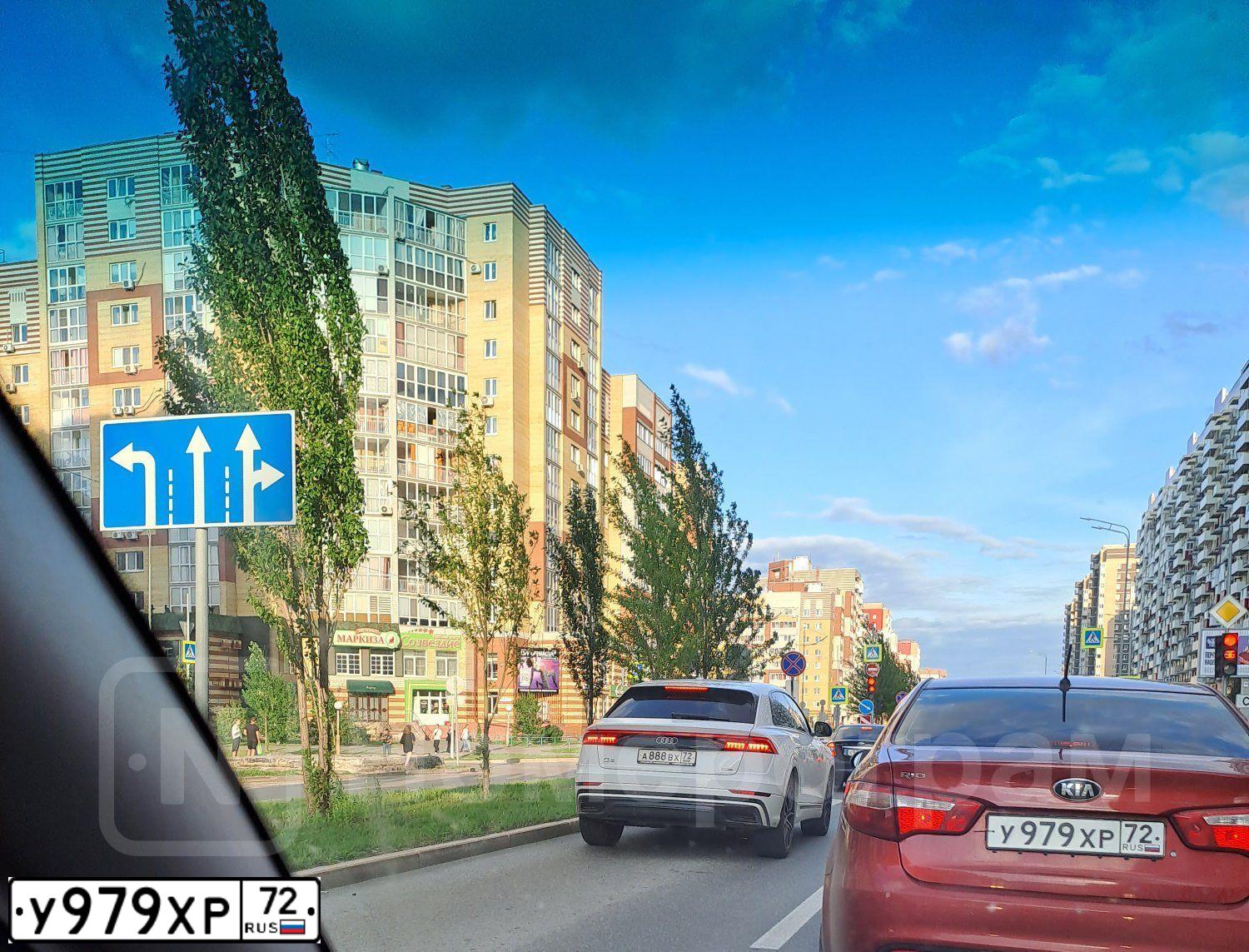 Фото автомобиля KIA RIO, 2014 — госномер У979ХР72. Цвет: Красный