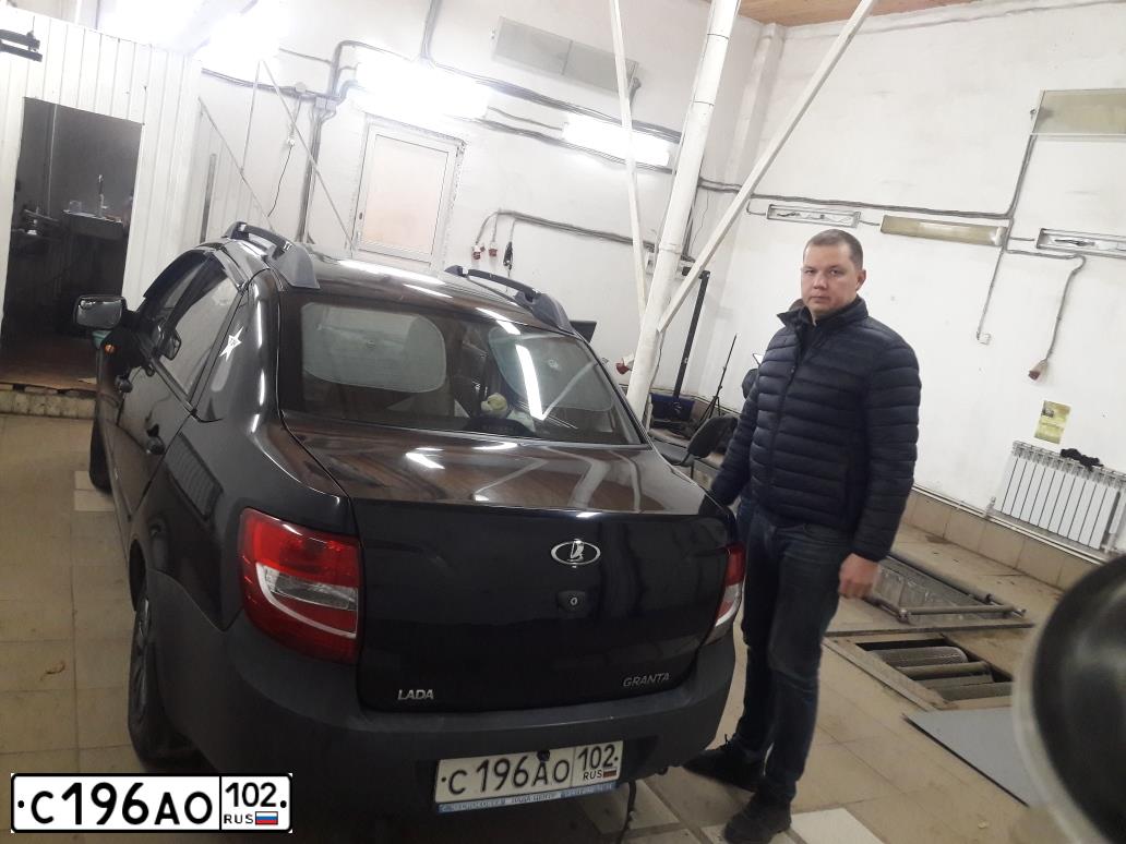 Фото автомобиля LADA 2190 GRANTA, 2014 — госномер С196АО102. Цвет: ЧЕРНЫЙ