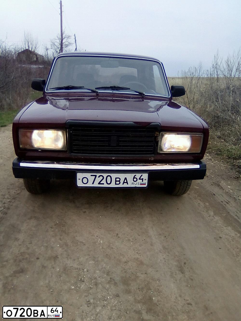 Фото автомобиля LADA 2107, 2008 — госномер О720ВА64. Цвет: ТЕМНО КОРИЧНЕВЫЙ