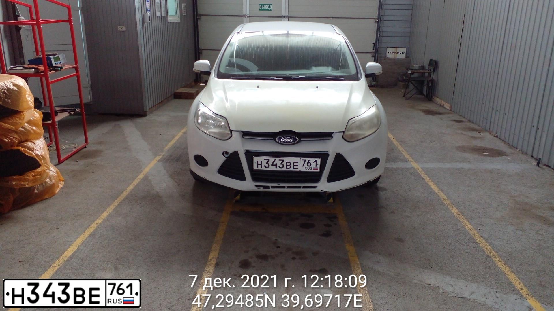 Фото автомобиля FORD FOCUS, 2011 — госномер Н343ВЕ761. Цвет: БЕЛЫЙ