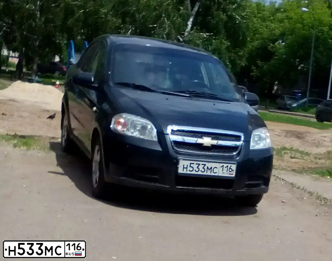Фото автомобиля CHEVROLET AVEO, 2011 — госномер Н533МС116. Цвет: ЧЕРНЫЙ