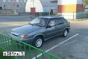 Фото автомобиля LADA 2114 SAMARA, 2008 — госномер Е381РА18. Цвет: СРЕДНИЙ СЕРО-ЗЕЛЕНЫЙ МЕТ
