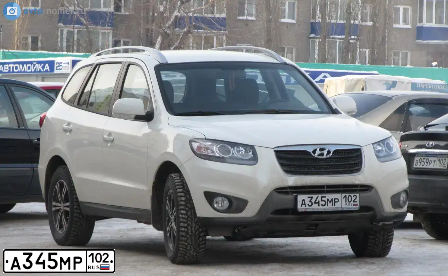 Фото автомобиля HYUNDAI SANTA FE, 2010 — госномер В163РН702. Цвет: Белый