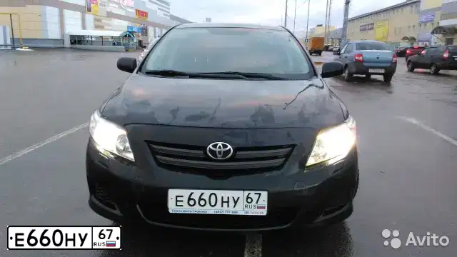 Фото автомобиля TOYOTA COROLLA, 2008 — госномер М697РУ67. Цвет: ЧЕРНЫЙ
