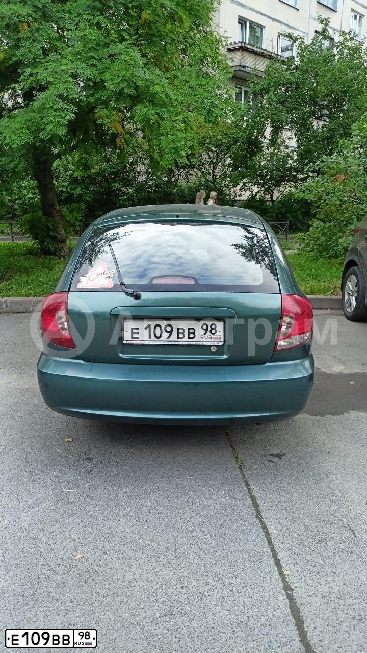 Фото автомобиля KIA RIO, 2005 — госномер Е109ВВ98. Цвет: ЗЕЛЕНЫЙ