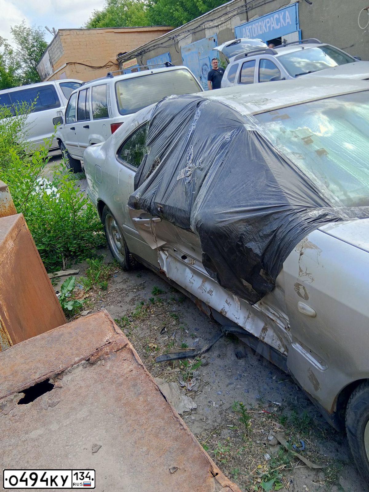 Фото автомобиля JEEP GRAND CHEROKEE, 1994 — госномер К209НУ34. Цвет: Белый