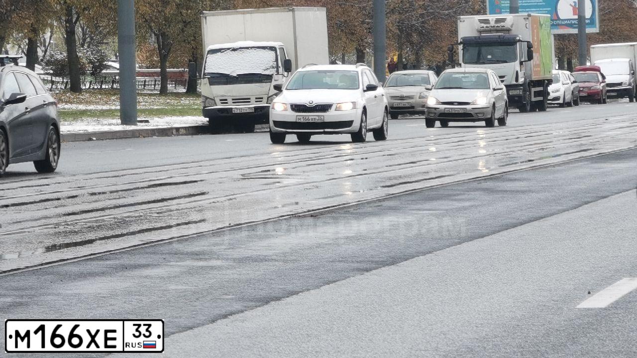 Фото автомобиля LADA 2112, 2009 — госномер М166ХЕ33. Цвет: ГРФИТОВЫЙ-МЕТАЛЛИК