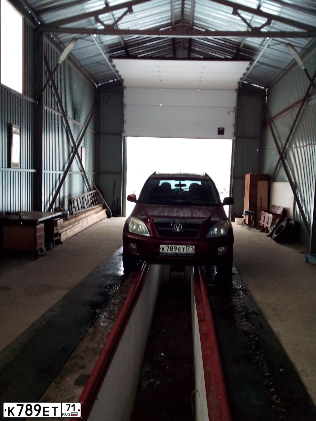 Фото автомобиля TAGAZ TINGO, 2011 — госномер В546ЕЕ252. Цвет: КРАСНЫЙ