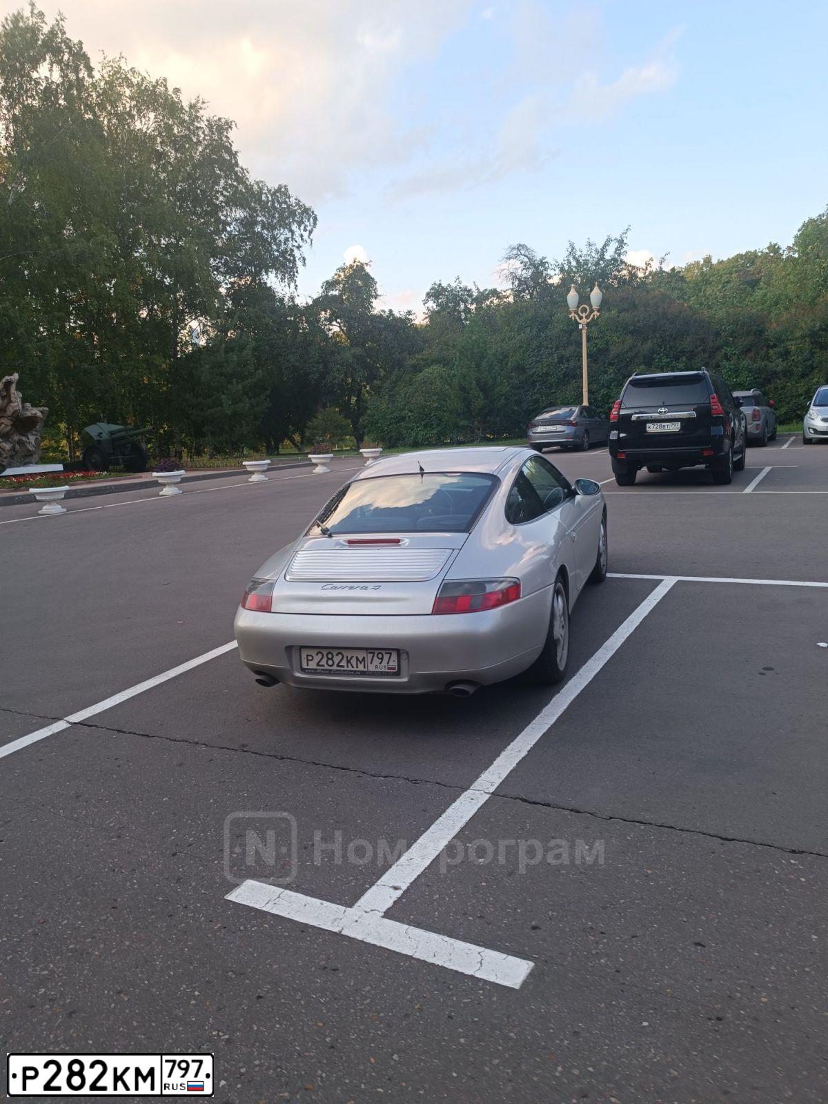 Фото автомобиля PORSCHE 911, 1999 — госномер А141АА77. Цвет: СВЕТЛО-СЕРЫЙ