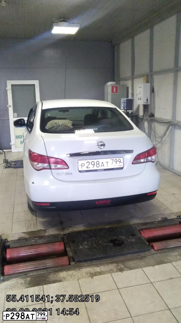 Фото автомобиля NISSAN ALMERA /AVTOVAZ/, 2017 — госномер Н115НО15. Цвет: БЕЛЫЙ-ЖЕЛТЫЙ-СЕРЫЙ