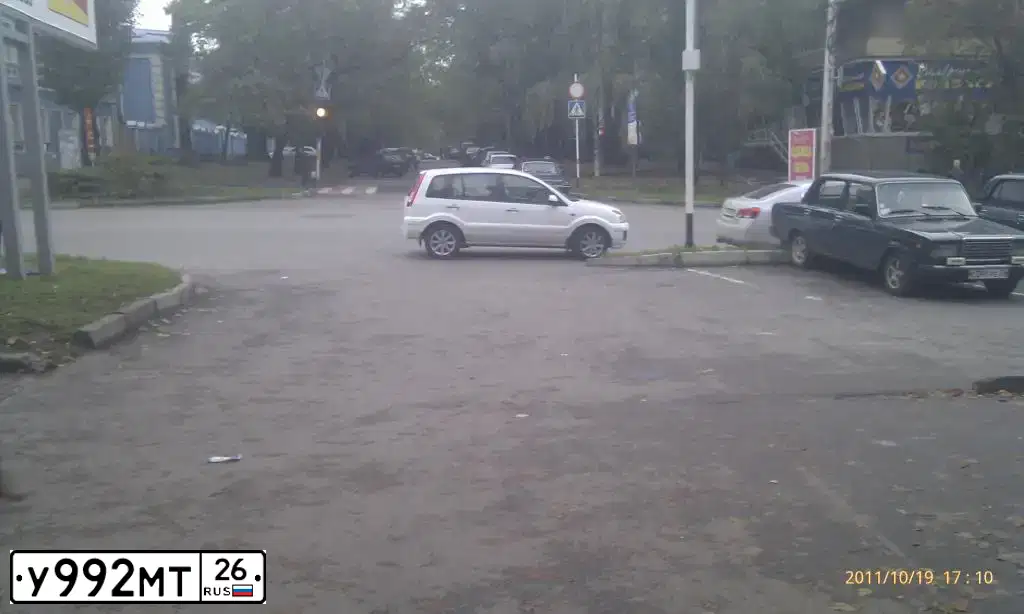 Фото автомобиля FORD FUSION, 2010 — госномер Н554ОК126. Цвет: Белый