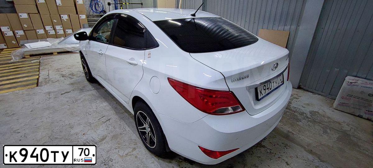 Фото автомобиля HYUNDAI SOLARIS, 2014 — госномер Р988ОС70. Цвет: Белый