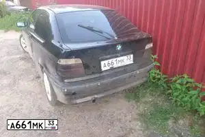 Фото автомобиля BMW SERIE 3, 1994 — госномер О348НА77. Цвет: ЧЕРНЫЙ