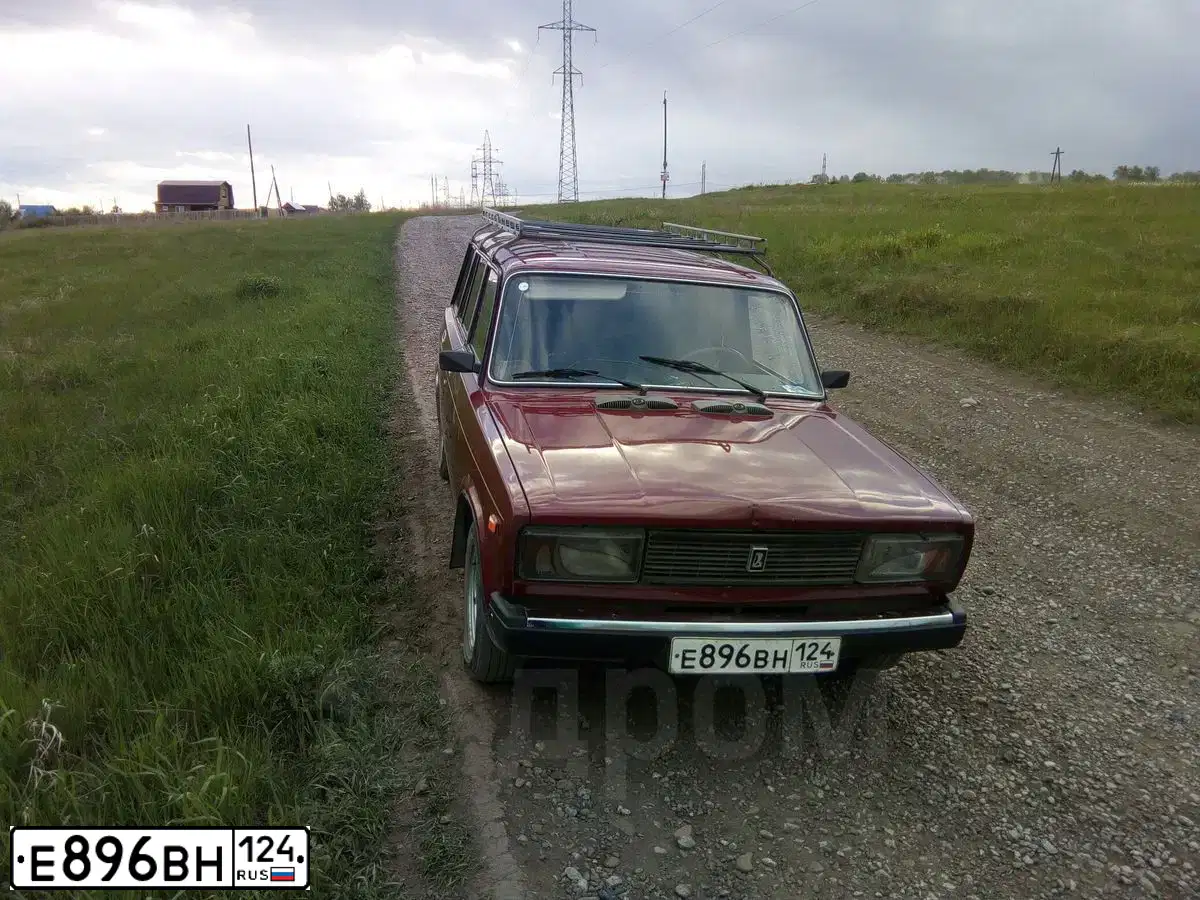 Фото автомобиля LADA 2104, 2010 — госномер А253ХК124. Цвет: Красный