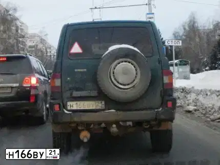 Фото автомобиля UAZ 3162 SIMBIR, 2003 — госномер Н166ВУ21. Цвет: МУРЕНА