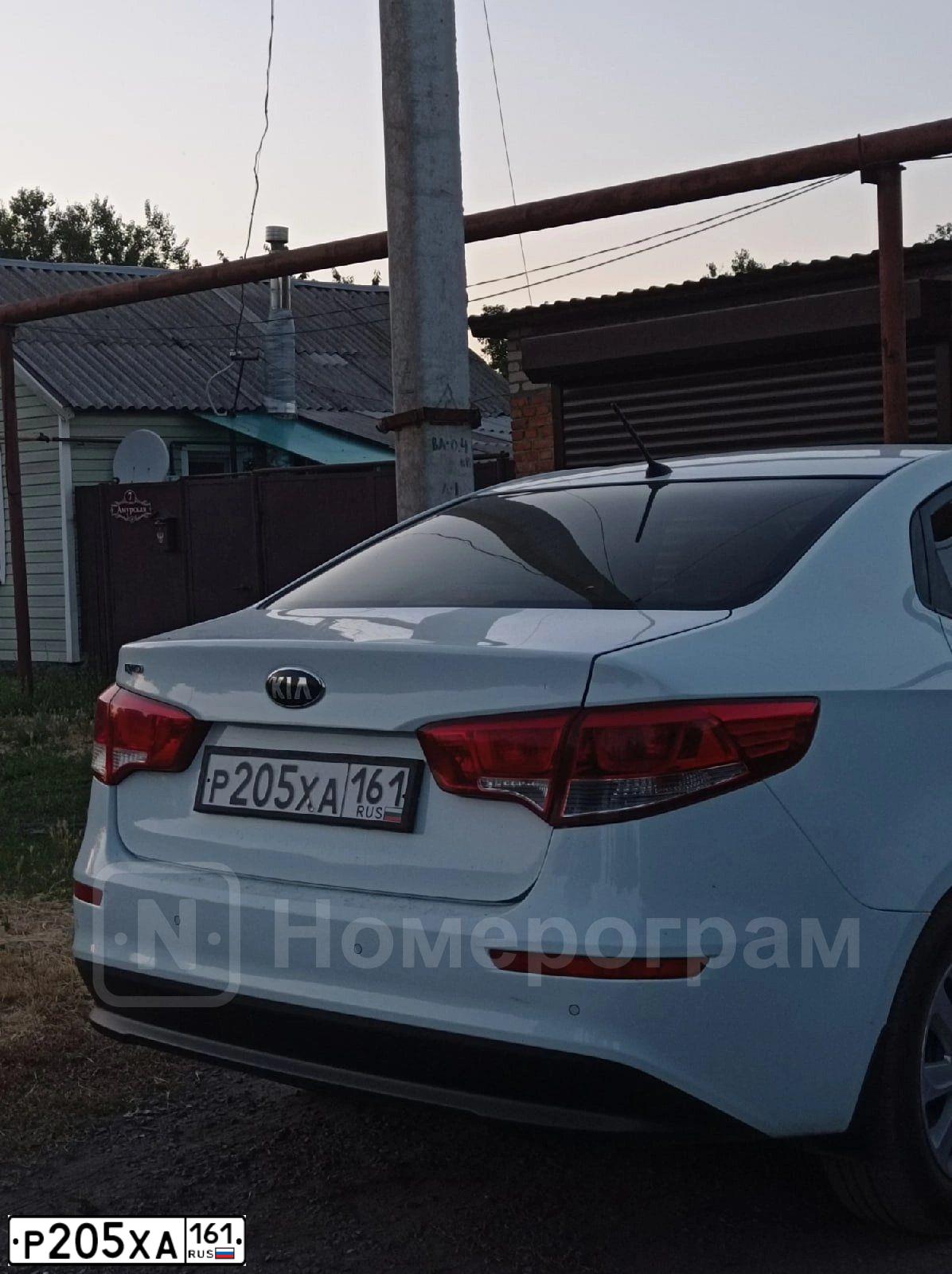 Фото автомобиля KIA RIO, 2016 — госномер Р205ХА161. Цвет: БЕЛЫЙ