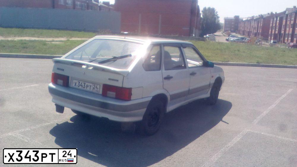 Фото автомобиля LADA 2114 SAMARA, 2005 — госномер Х343РТ38. Цвет: СЕРЫЙ