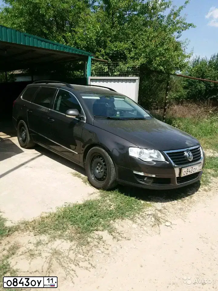 Фото автомобиля VOLKSWAGEN PASSAT, 2009 — госномер Е722УТ716. Цвет: ТЕМНО-КОРИЧНЕВЫЙ