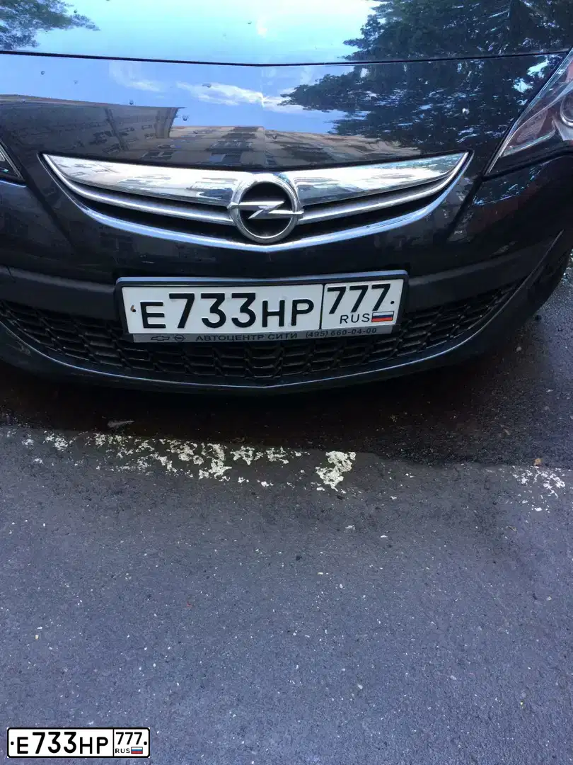 Фото автомобиля OPEL ASTRA, 2014 — госномер Е733НР777. Цвет: ЧЕРНЫЙ