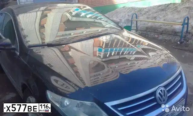 Фото автомобиля VOLKSWAGEN PASSAT, 2011 — госномер Е154ХВ21. Цвет: ЧЕРНЫЙ