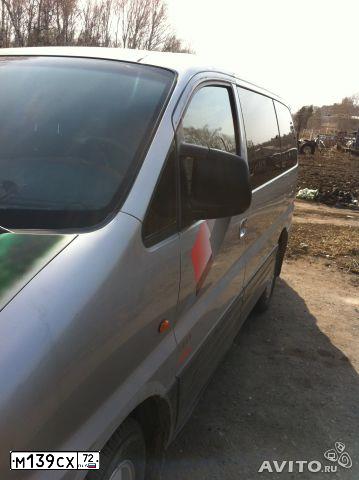 Фото автомобиля HYUNDAI H 1/H 100/STAREX, 2002 — госномер М139СХ72. Цвет: СЕРЫЙ