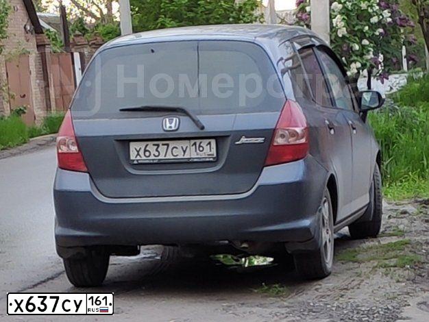Фото автомобиля HONDA JAZZ, 2008 — госномер Х637СУ161. Цвет: Т.СЕРЫЙ