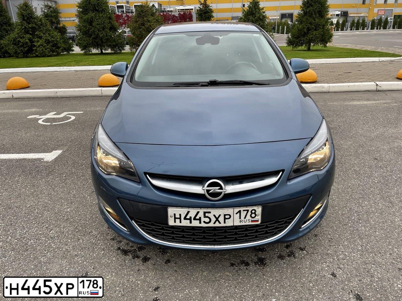 Фото автомобиля OPEL ASTRA, 2012 — госномер К077НО53. Цвет: СИНИЙ МЕТАЛЛИК