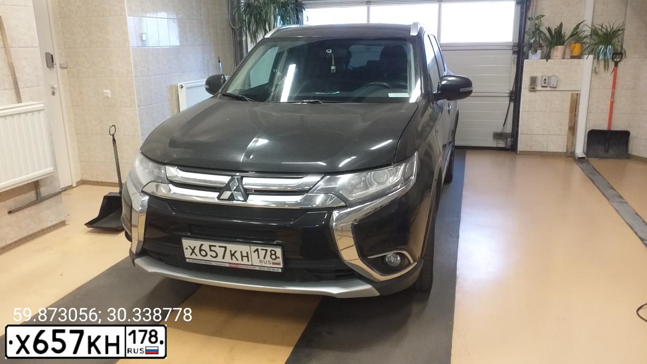 Фото автомобиля MITSUBISHI OUTLANDER, 2017 — госномер Х657КМ178. Цвет: ЧЕРНЫЙ