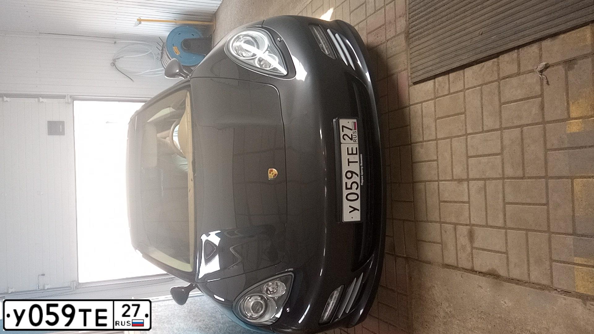 Фото автомобиля PORSCHE PANAMERA, 2011 — госномер В001АУ27. Цвет: ТЕМНО-СЕРЫЙ
