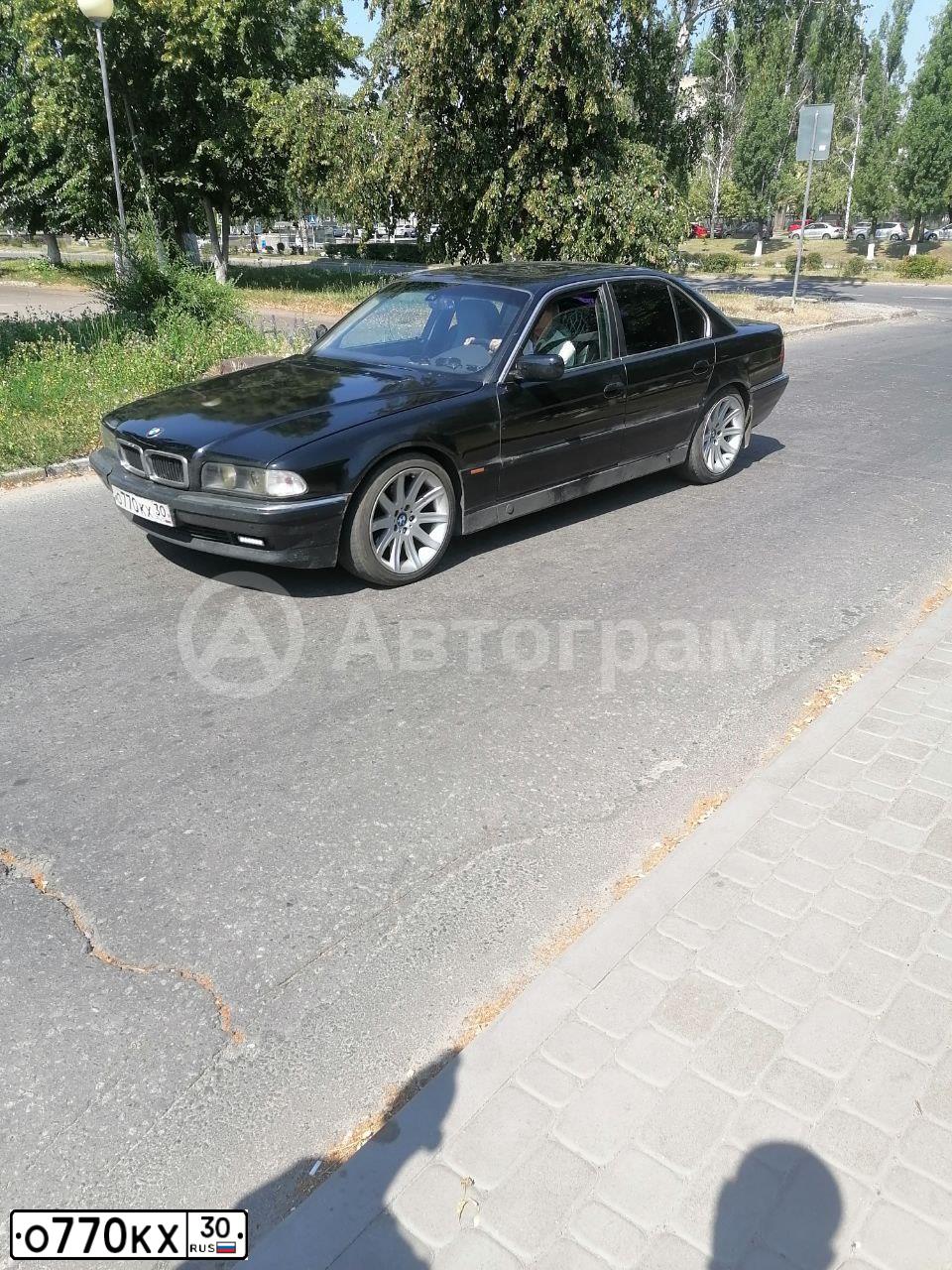 Фото автомобиля BMW SERIE 7, 1994 — госномер О770КХ30. Цвет: ЧЕРНЫЙ