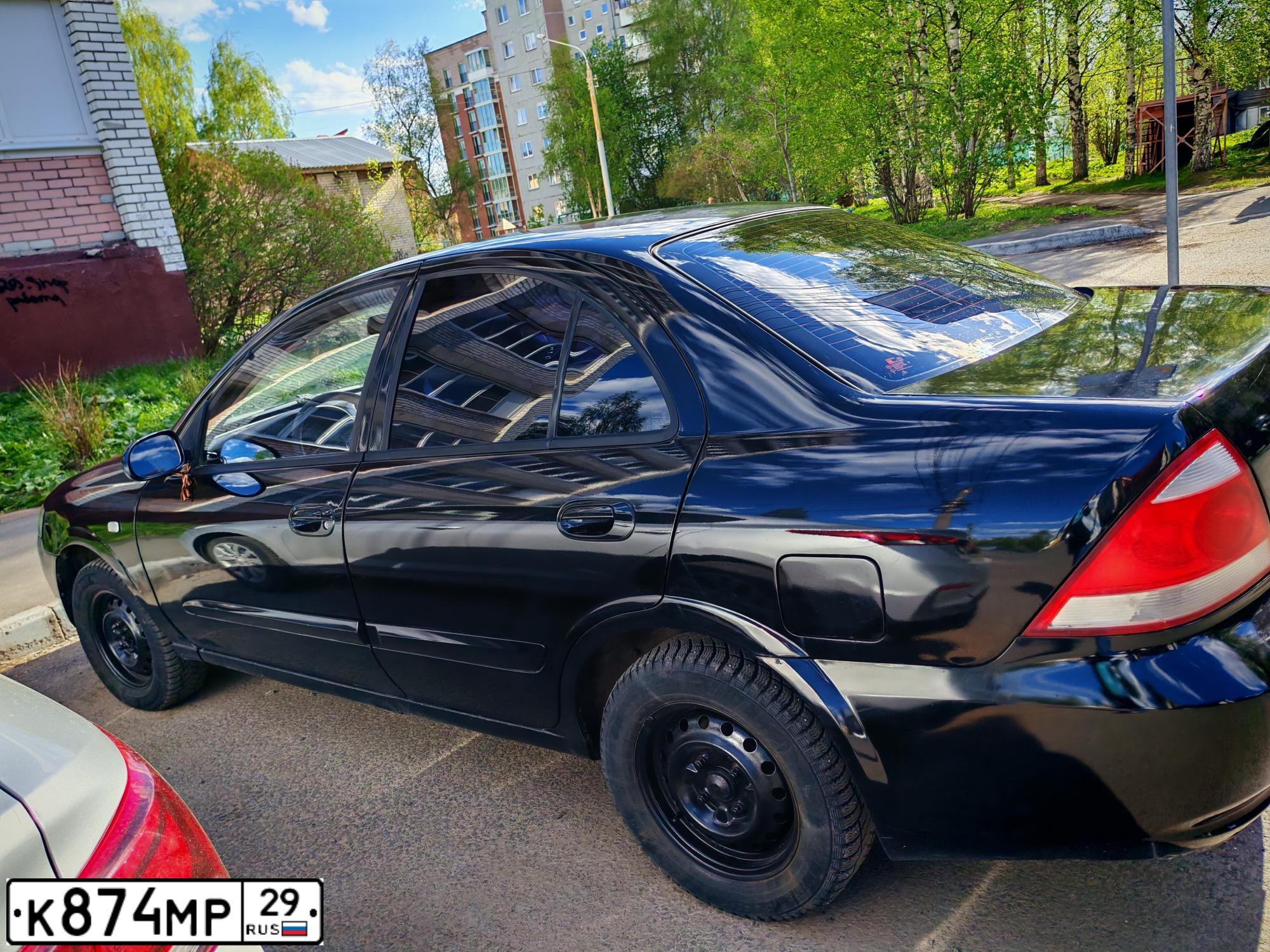 Фото автомобиля NISSAN ALMERA, 2010 — госномер К261ВХ29. Цвет: ЧЕРНЫЙ