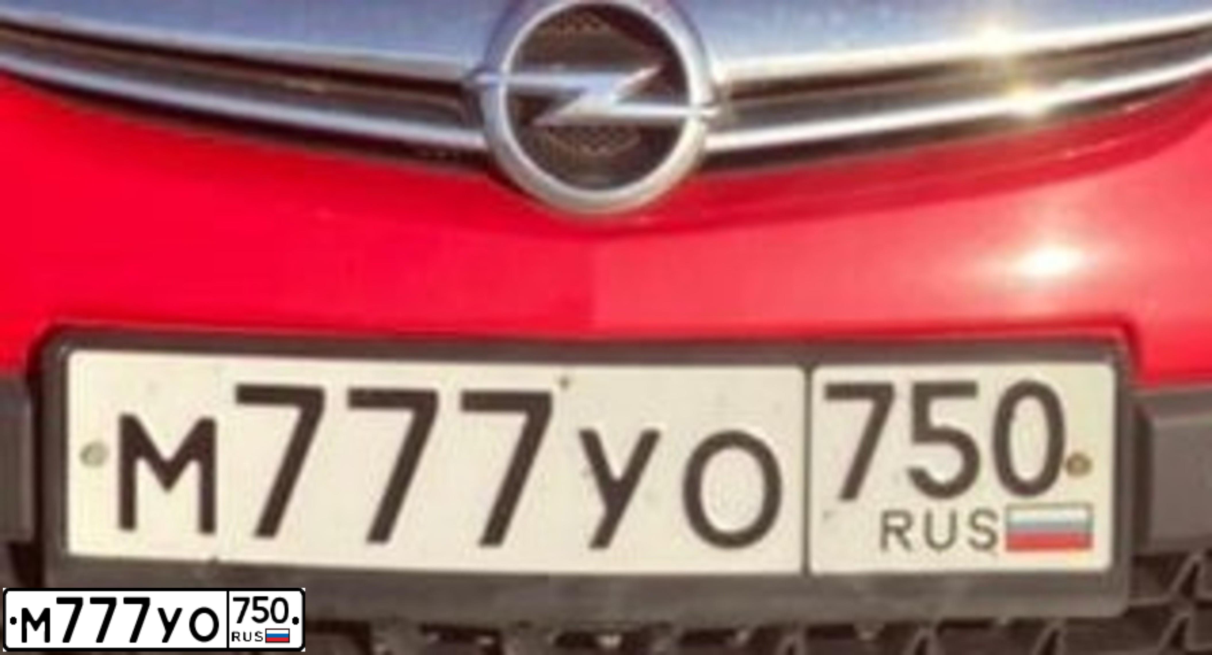 Фото автомобиля OPEL ASTRA, 2013 — госномер Е233ВР777. Цвет: Красный