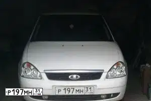Фото автомобиля LADA 2172 PRIORA, 2011 — госномер Т915СА31. Цвет: БЕЛЫЙ