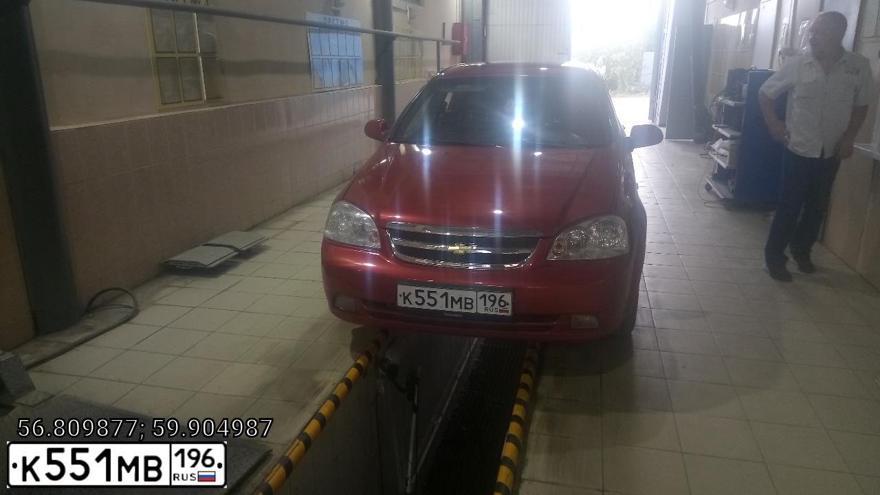 Фото автомобиля CHEVROLET LACETTI, 2006 — госномер Т330ВХ59. Цвет: Красный