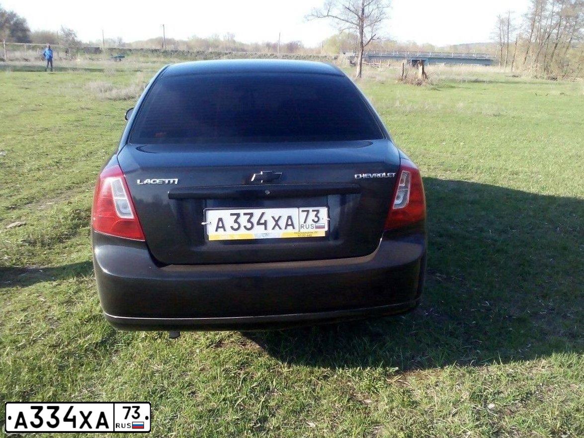 Фото автомобиля CHEVROLET LACETTI, 2006 — госномер А334ХА73. Цвет: ЧЕРНЫЙ
