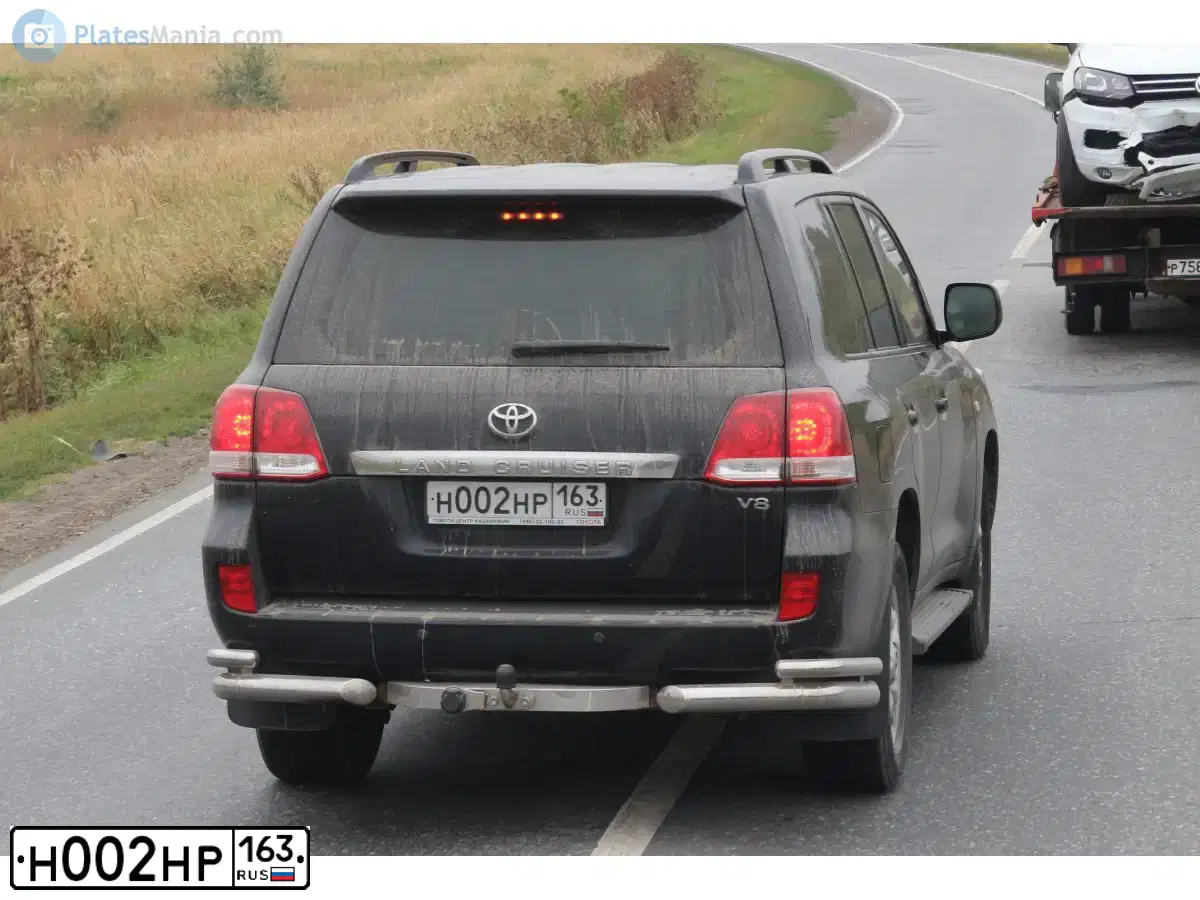 Фото автомобиля TOYOTA LANDCRUISER 200, 2010 — госномер Н002НР163. Цвет: ЧЕРНЫЙ