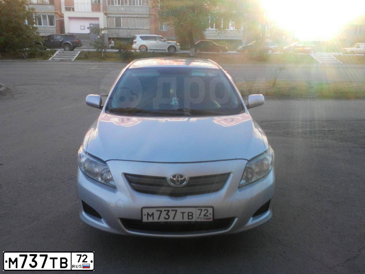 Фото автомобиля TOYOTA COROLLA, 2007 — госномер Е919ОР72. Цвет: СЕРЕБРИСТЫЙ