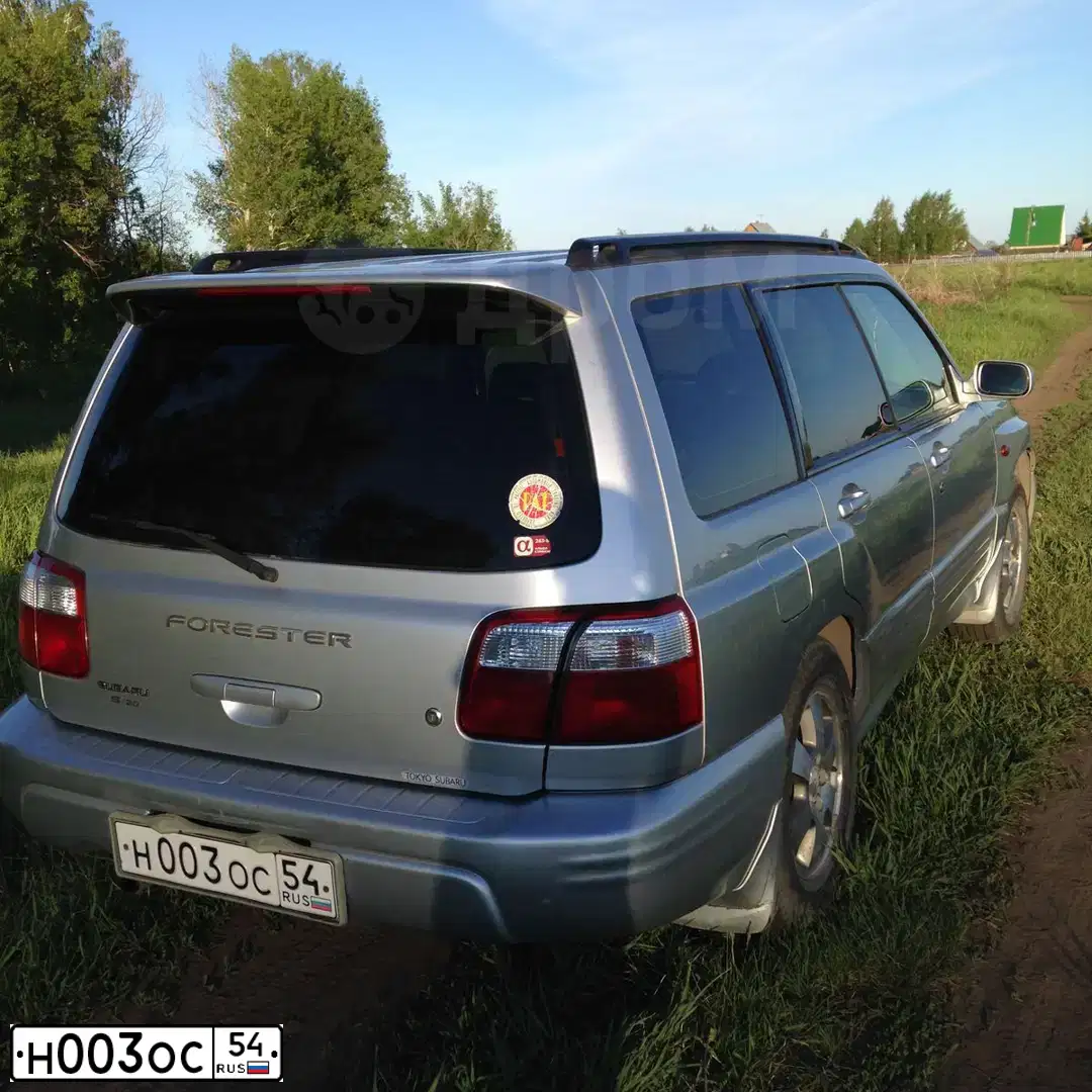 Фото автомобиля SUBARU FORESTER, 2007 — госномер Н003ОС54. Цвет: серебристый