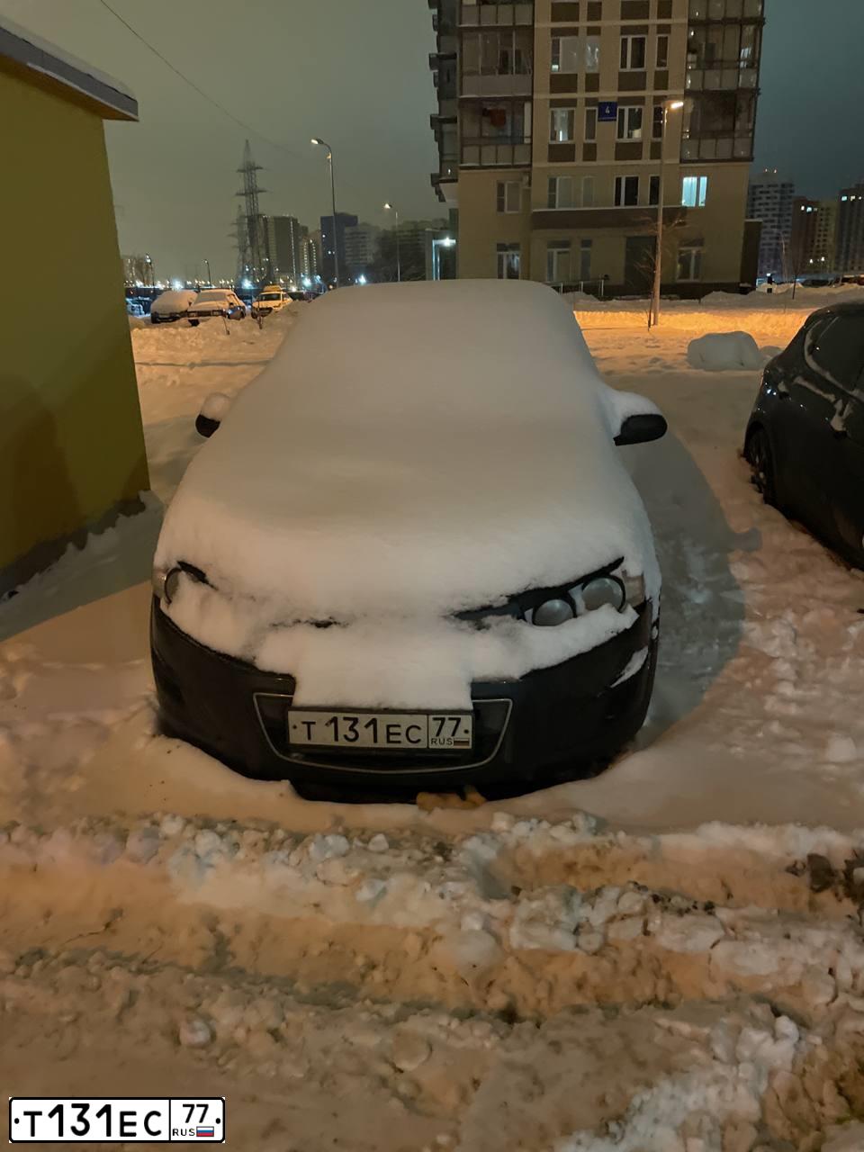 Фото автомобиля CHEVROLET AVEO, 2012 — госномер Т131ЕС77. Цвет: ЧЕРНЫЙ